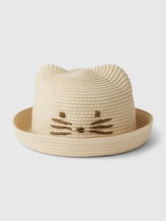 Woven paper straw hat.  Wide brim.  Certain styles have graphics at top.  For more fit and sizing info, check out our Size Guide.