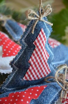 a red white and blue christmas tree made out of old jeans with burlap