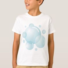 a young boy wearing a t - shirt with bubbles on it