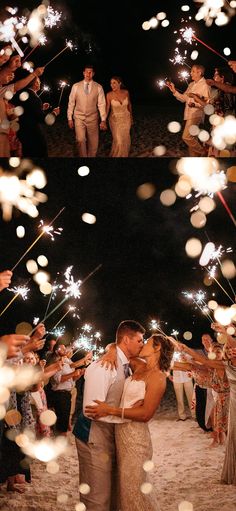 a couple kissing under sparklers on the beach