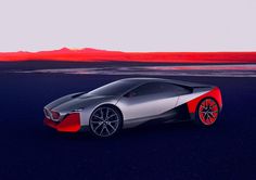 a futuristic car is shown in front of an orange sky