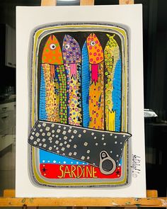 an easel with a painting on it that says sardine