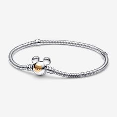 Make Precious Memories Last Forever With Our Disney 100th Anniversary Moments Snake Chain Bracelet. Hand-Finished In Sterling Silver, This Limited Edition Collector’s Piece Features A Mickey Mouse-Shaped Clasp With A 14k Gold Circle Engraved With “Disney 100”. Style It With Your Favourite Disney X Pandora Charms To Celebrate 100 Years Of Wonder. Compatible With Pandora Moments Collection Disney X Pandora Colour No Color Product Type Bracelets Item 592514c00-21 Metal Sterling Silver And 14k Gold Charms Disney, Disney 100th Anniversary, Pandora Charms Disney, Disney Bracelet, Disney 100, Charms Pandora, Bracelet Pandora, Pandora Disney, Charm Pandora