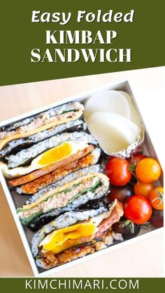 an easy folded kimbap sandwich with tomatoes and eggs on the side in a white tray