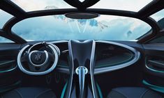 the interior of a futuristic car with mountains in the background