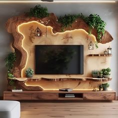 a living room with a large tv on the wall and some plants growing out of it