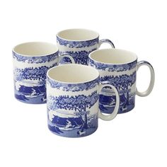 four blue and white coffee mugs sitting next to each other