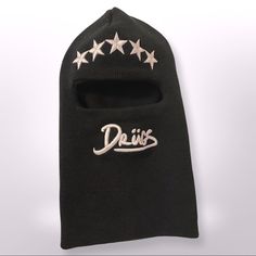 a black beanie hat with five stars and the word davis written on it's side