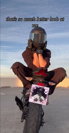 a person sitting on top of a motorcycle with the caption that says, that's so much better looks at me