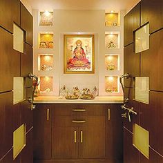 a bathroom with wooden cabinets and artwork on the wall