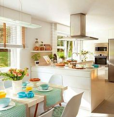 the kitchen is clean and ready to be used as a dining room or breakfast nook