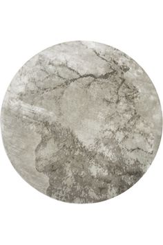 a round marble table top with grey and white colors