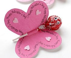 three valentine's day candy hearts on a white background with the words happy valentine's day written on them