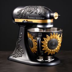 a black and gold mixer with sunflowers on it