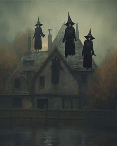 three witches flying over a house in the fog