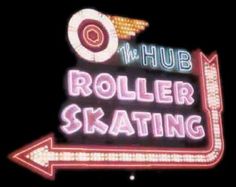 a sign that says roller skating with an arrow pointing to the right and another direction