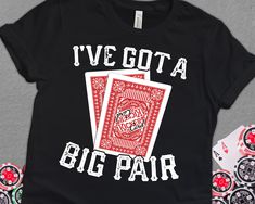 i've got a big pair t - shirt with playing cards on the front