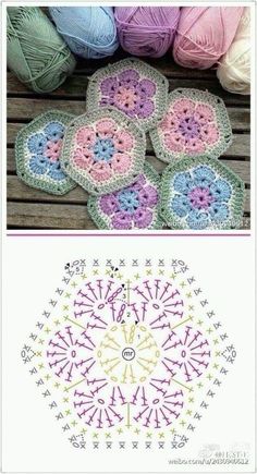 several crocheted dois and balls of yarn on a wooden table with the same pattern