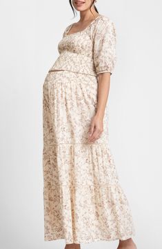 Perfect for a dreamy maternity photo shoot, this smocked top and matching maxi skirt boast a calligraphy-inspired floral print that's just right. Top has square neck; elbow-length sleeves with elastic cuffs Skirt has smocked waist Under- or over-the-bump waistband 100% cotton Machine wash, line dry Imported Maternity Crop Top, Maternity Crop Tops, Crop Top Maxi Skirt, Maxi Skirt Crop Top, Maternity Photo Shoot, Floral Two Piece, Hairstyling Products, Smocked Top, Rollerball Perfume