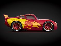 a red and yellow race car with flames on it's side, against a black background
