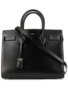 Saint Laurent Sac De Jour Tote Bag | Farfetch.com Parisian Elegance, Fashion Things, Black Leather Tote Bag, Black Leather Tote, Black Leather Handbags, Saint Laurent Bag, Work Bag, Work Bags, Leather Logo