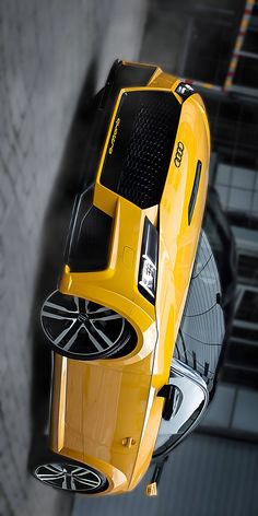 an overhead view of a yellow sports car