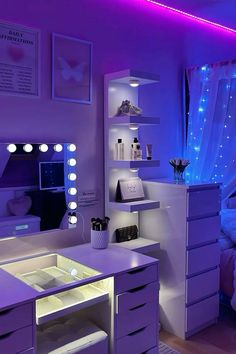 a bedroom with purple lighting and white furniture