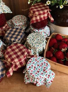 strawberries and other fruit are sitting on the table