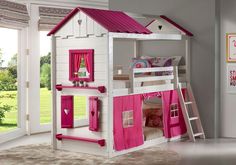 a pink and white bunk bed in a child's room