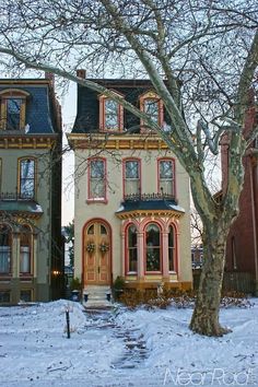 the instagram page on instagram com shows an old house with red trim and windows