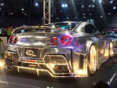 a car is on display at an auto show