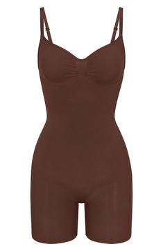 a women's brown bodysuit with straps on the front and side, featuring an open