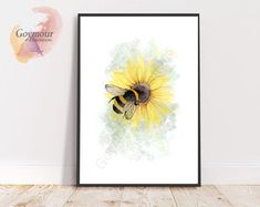 a bee sitting on top of a sunflower in front of a wall with the words gommaur
