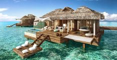 an image of some huts in the water with text that reads, sands to open overwater bunglow suites in jamaica