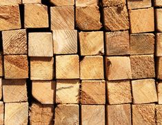 many pieces of wood are stacked together on top of each other in order to look like they have been cut down