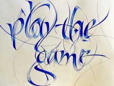 some type of calligraphy that is blue and has the words'please game'written on it