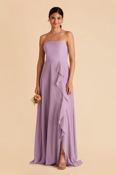 a woman in a strapless purple dress