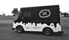 a black and white photo of an ice cream truck