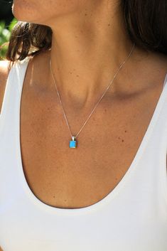 This pretty Navajo Petite Turquoise Pendant is a feminine look for a smaller person or for those who like a more modest design in jewelry. The square blue turquoise stone is bezel set and framed by smooth sleek sterling silver. A perfect piece on its own or for layering. The 18" sterling silver box chain included. Stamped "Sterling" Nature, Silver Turquoise Necklace, Turquoise And Silver Necklace, Turqouise Jewelry, Real Turquoise Jewelry, Turquoise Jewelry Necklace, Jewelry Necklace Simple, Silver Smithing, Clear Winter