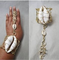 "This listing is for one wire wrapped cowrie shell cuff bracelet handpiece. This is a beautiful statement piece. The large cowrie shell is  2 3/4\" to 3 1/2\" wrapped with your choice of silver, gold, or copper colored tarnish resistant aluminum wire.  Shells may vary in color and texture from the one shown. The cuff is made at 7\" but the ends are designed to be adjusted to a larger or smaller wrist size for your comfort.   Choose your middle finger ring size from the drop down menu and the col Beaded Seashell, Bracelet Seashell, Wire Cuff Bracelet, Cowrie Shell Jewelry, Afrocentric Jewelry, Seashell Bracelet, Middle Finger Ring