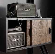 two wooden cabinets with headphones on top