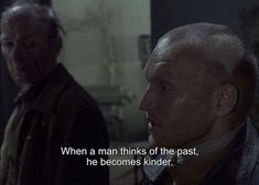 two men standing next to each other with a quote on the back ground that reads, when a man thinks of the past, he becomes kind of being