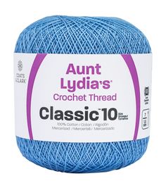 blue yarn ball with the words'classic 10'written in pink on it,