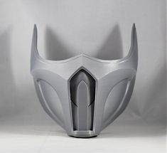 the helmet is designed to look like it has horns on its head and two eyes