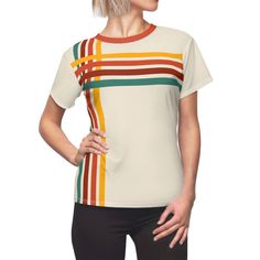 Embrace the timeless allure of the past with our Mid-Century Modern Women's Polyester Shirt, a perfect amalgamation of style and comfort that transports you back to the chic era of the 1950s/60s/70s. Revel in the symphony of retro stripes that adorn this vintage-inspired masterpiece, meticulously designed to evoke the spirit of a bygone age. 👕 Unique Retro T-Shirt Womens Design: Tailored to reflect the iconic trends of the mid-20th century, this shirt boasts a distinctive retro t-shirt design that sets you apart from the crowd. 🎨 Retro T-Shirt Graphics: Dive into the world of nostalgia with authentic retro t-shirt graphics, capturing the essence of the era with colors like cream, off-white, orange and teal. 🌟 Quality Craftsmanship: Each shirt is a testament to superb workmanship, ensuri 1960s Inspired, Polyester Shirt, Retro Mode, Retro Stripes, Retro T Shirt, 1970s Fashion, Retro Women, Retro Aesthetic, Retro Tshirt