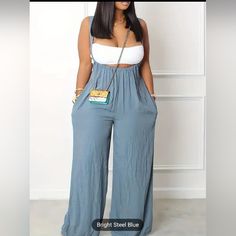 Women’s Casual Boho Wide Leg Solid Textured Suspender Loose Jumpsuit High Rise Design, Fixed Suspenders, Wide Legs, Side Pockets Material Fabric Is 65% Polyester, 35%Cotton Colors Available: Rose Pink/Steel Blue/Black Size: L(8/10) Waist Size: 45.7" Hip Size:48.1" Bottom Length:41.8" Inseam:24.8" Crop Top And Purse Not Included * Please Message Me For Your Desired Color. Casual Pieces, Suspender Jumpsuit, White Camo, Suit Style, Jumpsuit Fashion, Boho Maxi Dress, Dress Trousers, Denim Jumpsuit, Top Fabric