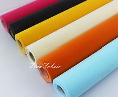 various colors of fabric on white background