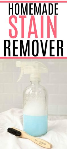 a homemade stain remover in a glass bottle with a wooden brush