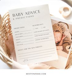 a baby advice card sitting on top of a basket