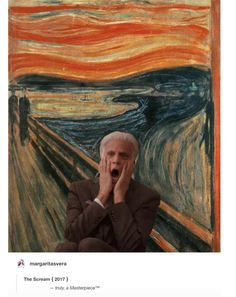 an old man is holding his hands up to his face in front of a painting